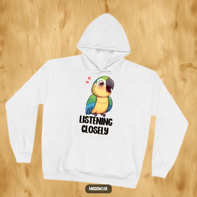 Funny Macaw Hoodie featuring a curious macaw tilting its head, wings slightly adjusted, as if mimicking a sound.
