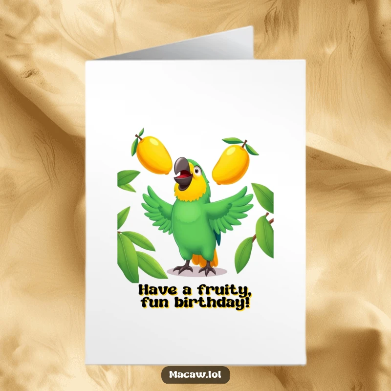 Funny Free Printable macaw birthday card, a laughing bird juggling mangoes, chaotic and hilarious downloadable greeting.