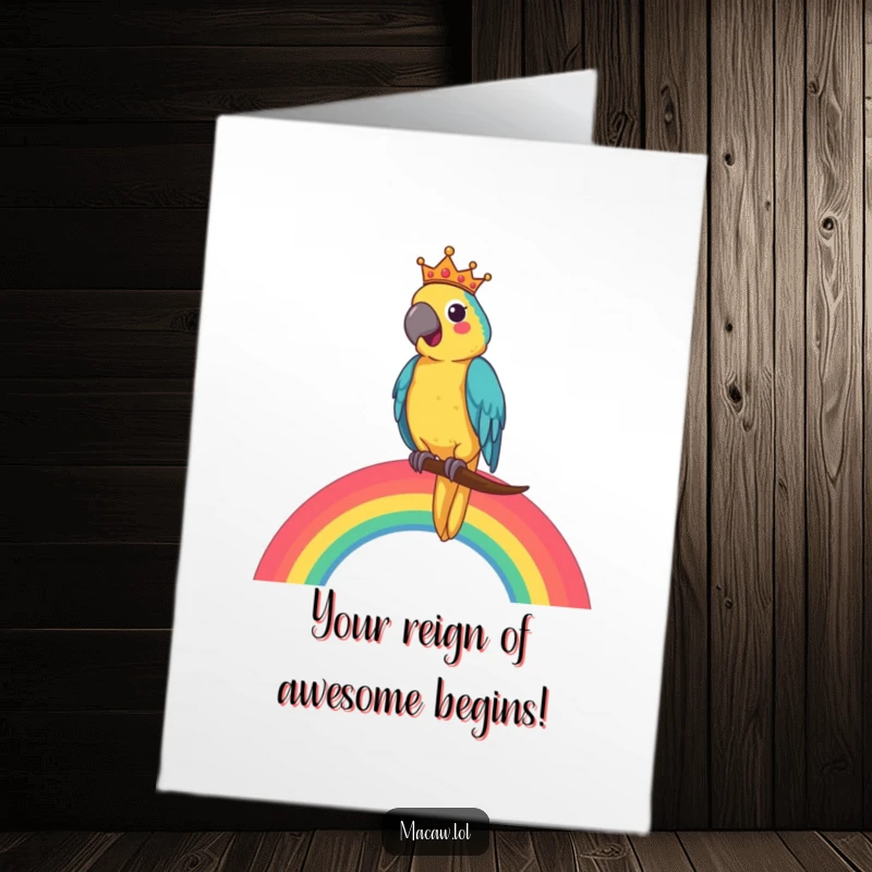 Funny Free Printable Congratulations Card: A cheerful macaw crowned like a king, sitting atop a bright rainbow.
