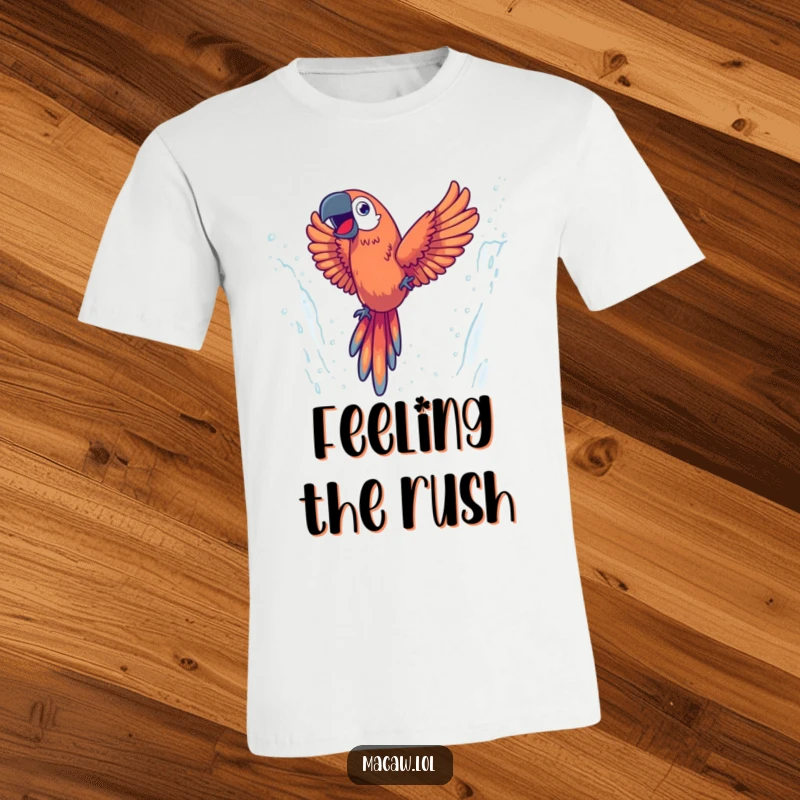 Funny T-shirt depicting an energetic macaw plunging with glee through a misty waterfall, symbolizing freedom and joy.