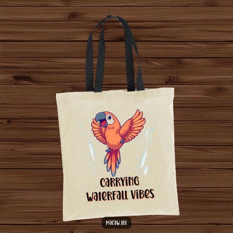 Funny tote bag showing an energetic macaw joyfully diving through a misty waterfall, perfect for carrying essentials on the go.